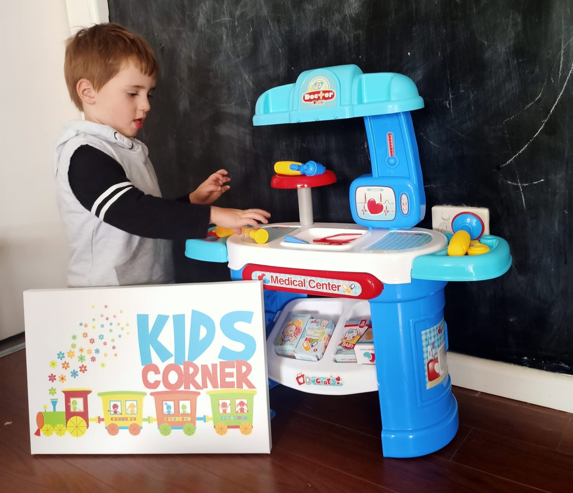 Kids Corner sign beside a toy doctor's play station